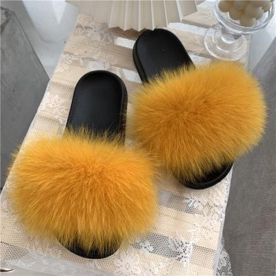 China Custom fashion trend logo furry flat slippers women fluffy fox fur real slips fur platform slippers for sale