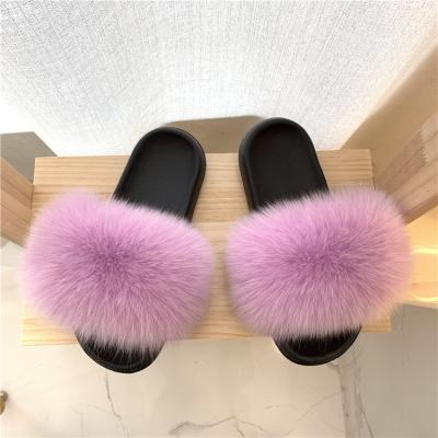 China Fashion trend lady fluffy pink fur wholesale real fur fuzzy slides slips fox fur slippers for women for sale