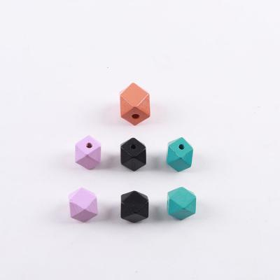 China Eco-friendly New Mixed Color Bulk Geometric Wood Beads Octagonal Wood Beads Painted Wood Beads DIY Jewelry Production for sale