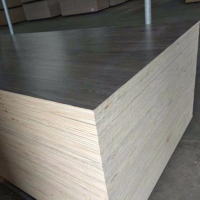 China Wells 1220*2440 18mm Melamine Laminated Plywood Sheet Indoor Artificial Veneer for sale