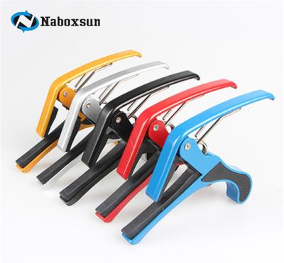 China Professional Best Selling Multi Function Custom Guitar Capo Can Place Picks Personalized Guitar Capo for sale