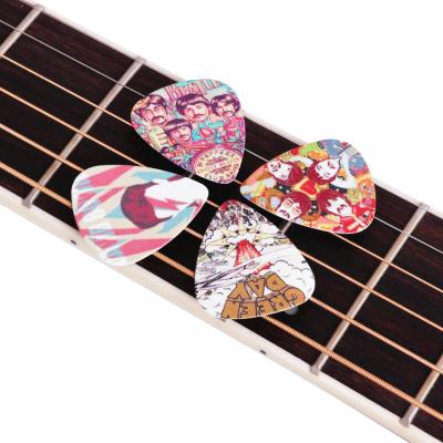 China Cheap GUITAR OEM Your Picks Logo Custom Guitar Pick 0.71mm ABS Smooth Plastic Plastic For Wood Guitar for sale