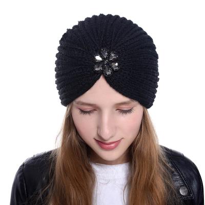 China COMMON Style Bohemian Winter Woolen Hat With Flowers And Diamond Knitted Hat Turban Hats For Women for sale