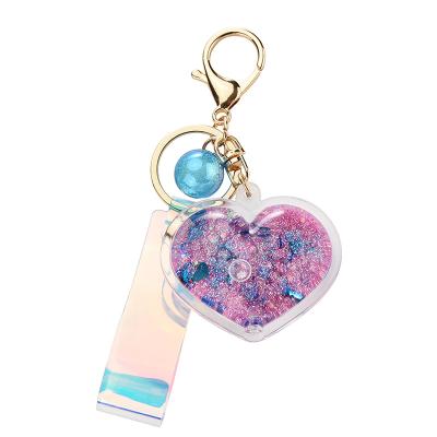 China Promotion Gift Key Chain Acrylic In Oil Bottle Quicksand Love Key Chain Glitter Peach Heart Car Key Chain Pendant for sale