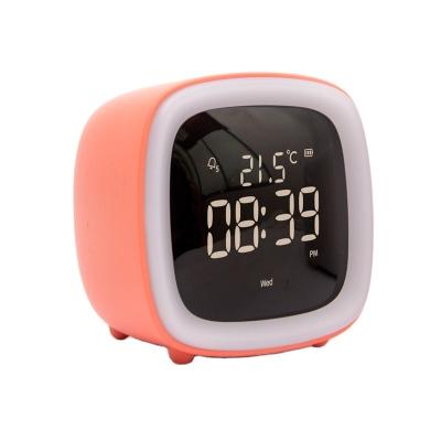 China Modern Cute Kids Quartz Alarm Clock with Night Light Digital Bedside Clock Inspired by TV Bedroom Design for sale