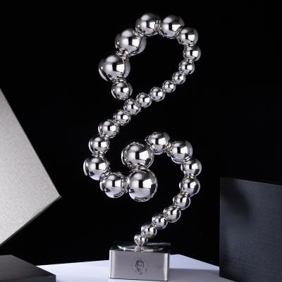 China Unique Design Europe Z9 Stainless Steel Art Craft Metal Sculpture For Business Gift for sale