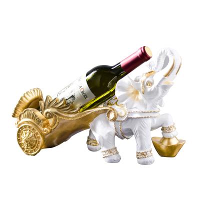 China Europe 2021 New Creative Elephant Wine Rack Opens Desktop Resin Wine Rack Ornaments Home Decoration Accessories for sale