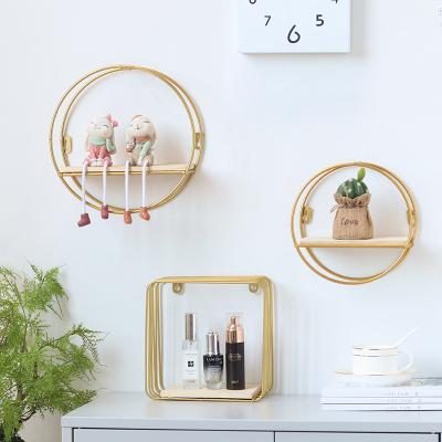 China Creative European Light Luxury Gold Living Room Wall Rack Wrought Iron Style Morden Style Finishing Rack for sale