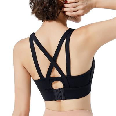 China New Running Style Breathable Women Push Up Yoga Shockproof Top Cross Back Sexy Sports Bra for sale