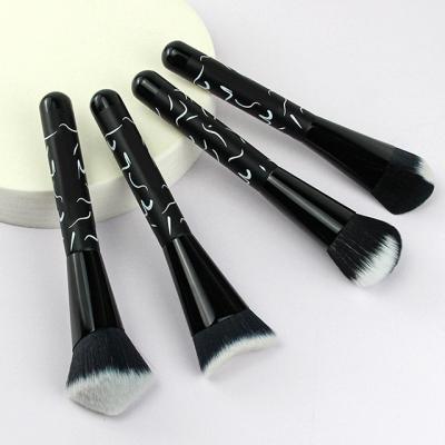 China Angular Blush Top Quality Makeup Brush Set 4pcs Black Solid Gold Makeup Brush Sets for sale