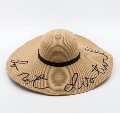 China Decoration Fashion Custom Women's Summer Beach Foldable Letter Embroidered Wide Brim Straw Floppy Beach Hat for sale