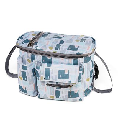 China Motion Sensing Diaper Handbags Diaper Clutch Bag Organizer Mommy Baby Diaper Waterproof Functional Bag for sale