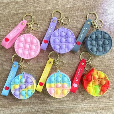 China Factory direct soft rubber cartoon coin purse silicone toy silicone fidgety person key chain key chains for phone bag car for gift for sale