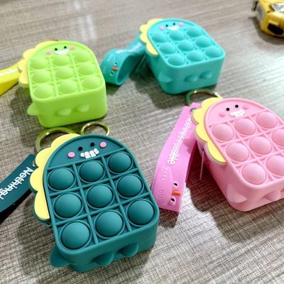 China Promotional Silicone Key Chain PVC Keychain Doll Wristband Cute Rubber Key Chains Bag Car Decoration Silicone Promotional Gifts Stir Toys for sale