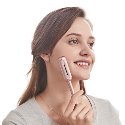 China Facial Body Mini Moxibustion Rolling Massager Pink Body Massager Relax Massage for sale