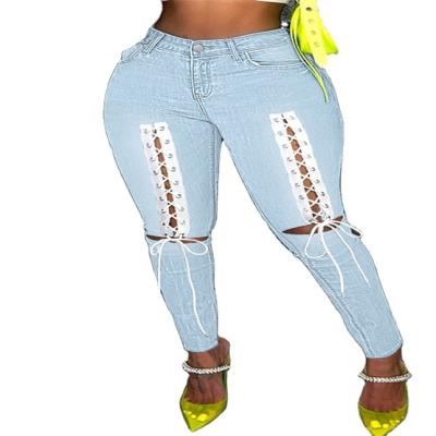 China 2022New arrivals QUICK DRY sexy street solid bandage hollowed out patchwork high waist jeans for sale