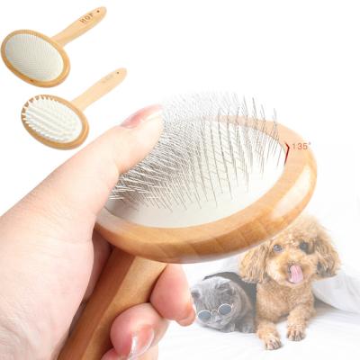 China New Viable Spot Pet Hair Removal Beauty Massager Dog Cat Supplies Hair Removal Massager Solid Wood Comb for sale