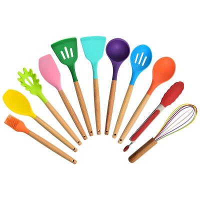 China Stocked 12 Pieces In 1 Kitchen Instruments Set Tools Stand Up Kitchen Tableware Silicone Cookware Set With Wooden Handles for sale