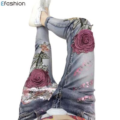 China Breathable Beaded Jeans Denim Pants Customized Flowers Embroidered Washed Denim for sale