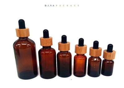 China Wholesale 30ml e-liquid glass dropper bottles with childproof cap and bamboo ring for sale