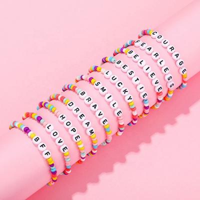 China Fashion Friendship Girls Kids Rainbow Color Bangle Gifts Soft Handmade Environmental Friendly Word Cute Letter Elastic Bracelets for sale