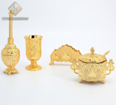 China 4Pcs Viable Gold Plated Round Cup With Sugar Pot Napkin Holder Holy Base Water Bottle for sale