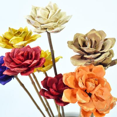 China Natural Cheap Natural Brown Orange Red Blue White Flower Backdrop Handmade Dried Wooden Flower for sale