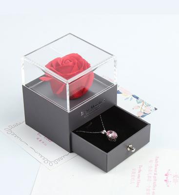 China Wholesale High Quality Recycled Materials PVC Square Embossing Rose Flower Hat Gift Box Clear With Coatings en venta