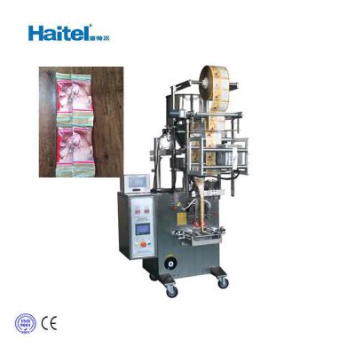 China Automatic Small Pouch Food Fish Shrimp Ball Nuts Vertical Packing Machine for sale