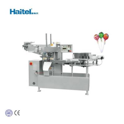 China Small Food Ball Lollipop Wrapping Machine Price Wrapper for sale