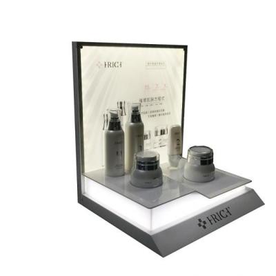 China luxury & Fancy Custom Acrylic Cosmetic Display Counter With Led Lighting for sale