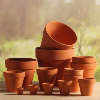 China Modern Indoor Outdoor Colorful Clay Ceramic Terracotta Planters Flower Pots for sale