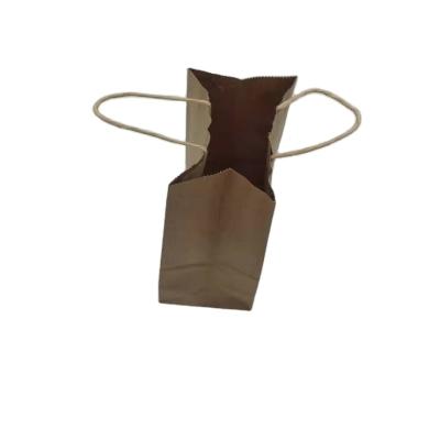 China Recyclable Recycled Brown Rope Handle Bags Bottom Square Kraft Paper Bag Food for sale