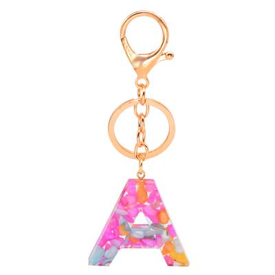 China Metal and Resin Design Handmade KC Gold Plated 26 Letter Resin Charm Key Chain Key Chain for sale