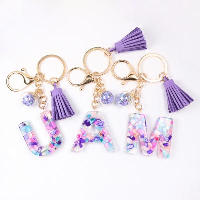 China New Drip Resin Tassel Charm Key Chain Purple Acrylic Crystal Stone Dangle Upper Case Key Chain for sale