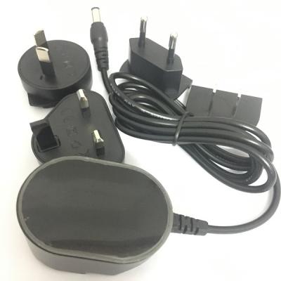 China Interchangeable World Plug AC Adapter 12v 2a 24v 1a Adapter Power Supply SR120-002-A for sale