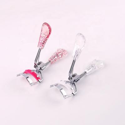 China Competitive Price Reusable Peach Heart Glitter Transparent Handle for Women Mascara Brush Eyelash Curler for sale