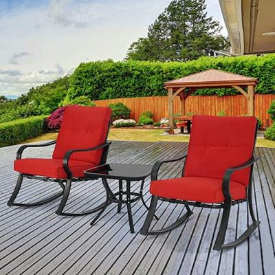 China Modern Outdoor Bistro Set of 3-Piece Rocking Chairs, Black Iron Patio Furniture with Red Thickened Cushion and Glass Top Coffee Table for sale