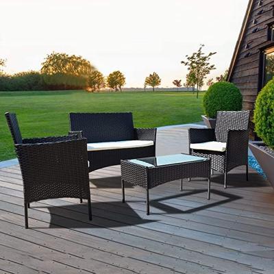 China Modern 4 PCS Garden Furniture Set Rattan Outdoor Table Chair Sofa Sets With Tempered Glass Table for sale