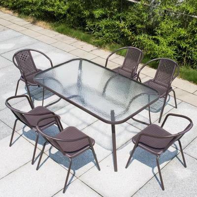 China Comfortable Outdoor Tables And Chairs With Umbrellas Combination Cafe Outdoor Leisure Iron Yard Rattan Outdoor Chair for sale