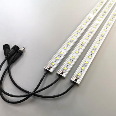 China Sports Stadiums SMD5050/SMD5730/SMD5630/SMD2835 IP67 Waterproof Led Hard Linear Strip Light DC12V/24V With OEM Cable for sale