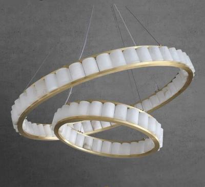 China Customized Nordic Style Circular Lighting Alabaster Modern Pendant Light For Foyer And Staircase Area for sale