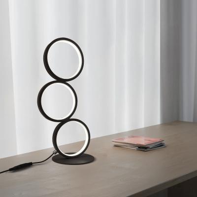 China Three Ring Elegant Metal Desk Lamp For Living Room Bedroom Hotel Club Lighting Modern Dimmable Aluminum Table Light for sale