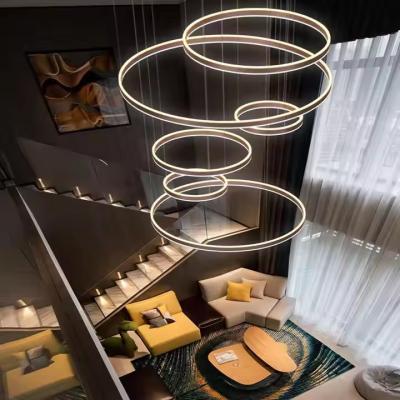 China Hotel Villa Treppen hohe Decke hängende schwarze Kaffee Gold Runde Kreis Ring Led Kronleuchter Anhänger Licht zu verkaufen