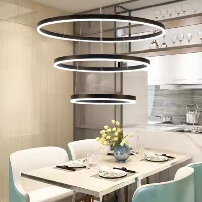 China Modern 3 Ring Design Hanging Decorative Ring Acrylic LED Chandelier Light Gold Hotel Lobby Living Room Long Stairwell Chandelier for sale