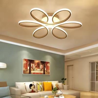 China Dimmable Gold Surface Mounted Led Acrylic Ceiling Light Minimalist Creative Ring Hanging Light Flower Shape Modern for sale