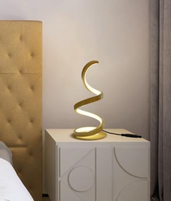 China New Simple Gold Spiral Acrylic Metal Bedroom Bedside Hotel Luxury Decorative Table Lamp for sale