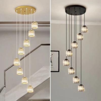 Cina Villa Hollow Iron Chandelier Oro/Nero Moderno Minimalista Luce di Scala di Cristallo Con Disegno Rotante in vendita