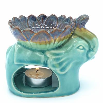 China Ceramic Candle Holder Thailand Style Elephant Shape Ceramic Aromatherapy Oil Burner Lamp Tea Light Candle Holder for sale