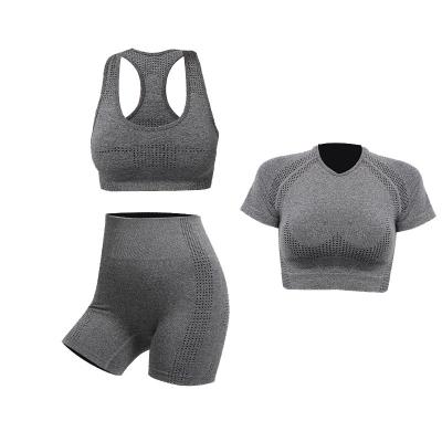 China New sports quick-drying breathable seamless bra yoga suit short-sleeved short-sleeved hip-lifting trouser yoga suit for sale